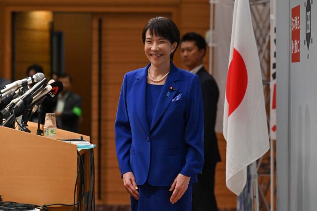 Japanese veteran Liberal Democratic Party (LDP) lawmaker Sanae Takaichi arrives to speak to the media during a press conference in Tokyo on September 19, 2025. Takaichi said on September 18 she will run in the ruling party's leadership election, a campaign that could make her Japan's first woman prime minister. (Photo by Richard A. Brooks / AFP)