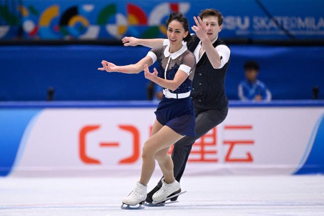 France's Camille Kovalev and Pavel Kovalev compete in the Pairs Short Program ISU Skate to Milano Figure Skating Qualifier 2025 in Beijing on September 19, 2025. (Photo by WANG Zhao / AFP)