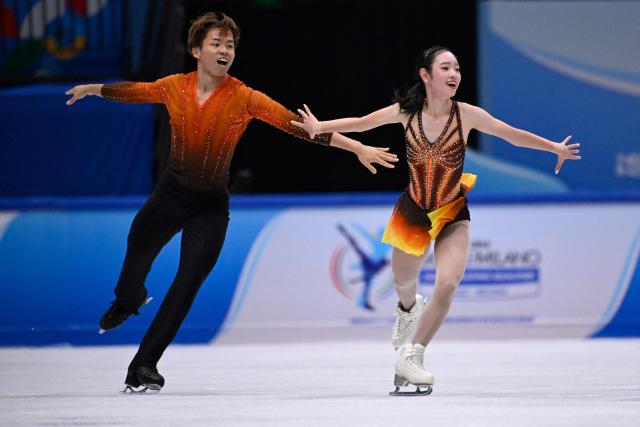 Japan's Yuna Nagaoka and Sumitada Moriguchi compete in the Pairs Short Program ISU Skate to Milano Figure Skating Qualifier 2025 in Beijing on September 19, 2025. (Photo by WANG Zhao / AFP)
