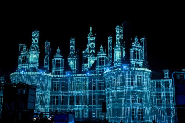 French DJ Michael Canitrot performs at the Chateau de Chambord for the opening of the Heritage Days on September 19, 2025, notably to fund renovation work. (Photo by GUILLAUME SOUVANT / AFP)