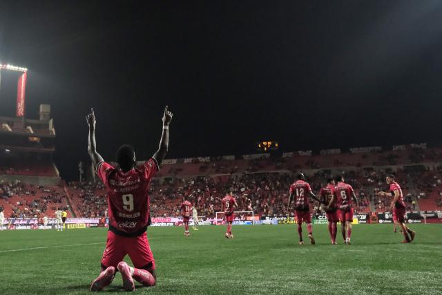 Tijuana's Jamaican midfielder #09 Shamar Nicholson celebrates scoring his team's fifth goal during the Liga MX Apertura tournament football match between Tijuana and Leon at the Caliente Stadium in Tijuana, Baja California, Mexico on September 19, 2025. (Photo by Guillermo Arias / AFP)
