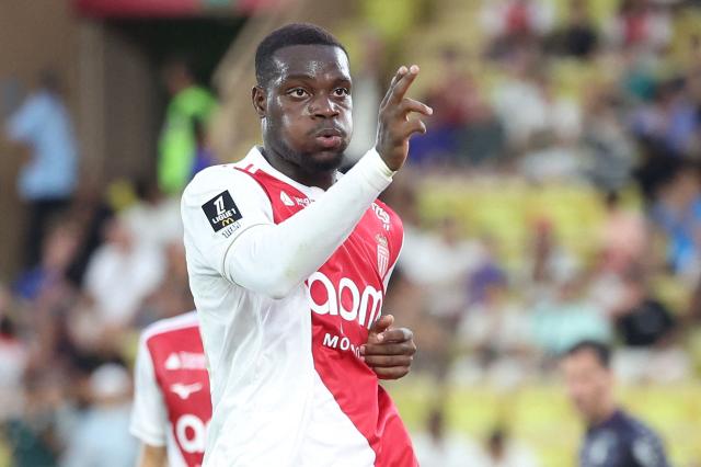 Monaco's French forward #19 George Ilenikhena celebrates after scoring a goal during the French L1 football match between AS Monaco and FC Metz at the Louis II Stadium (Stade Louis II) in the Principality of Monaco on September 21, 2025. (Photo by Valery HACHE / AFP)