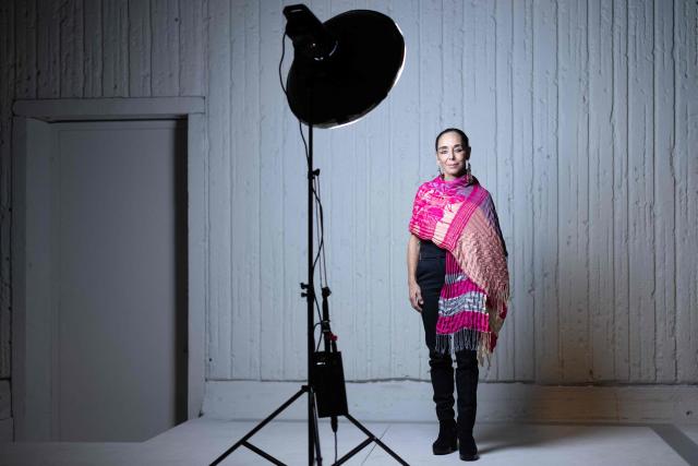 (FILES) Iranian artist Shirin Neshat poses during a photo session at the Opera Bastille in Paris on September 5, 2025. "If only the audience could feel it like a knife in the stomach": Iranian-American visual artist Shirin Neshat directs the opera 'Aida' at the Paris Opera, a version that, by showing the brutality of war, religious fanaticism and the oppression of the weak, "resonates with current events". (Photo by JOEL SAGET / AFP)