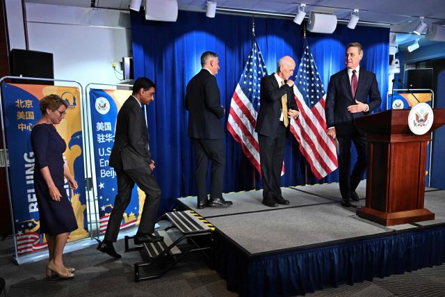 (L-R) Chrissy Houlahan, Democratic member of House Armed Services Committee, Rohit Khanna, Democratic member of House Armed Services Committee, Michael Baumgartner, Republican member of House Foreign Affairs Committee, US Representative Adam Smith, Democratic ranking member of the House Armed Services Committee and David Perdue, US Ambassador to China, arrive to a press conference at the US embassy in Beijing on September 23, 2025.  (Photo by Pedro PARDO / AFP)