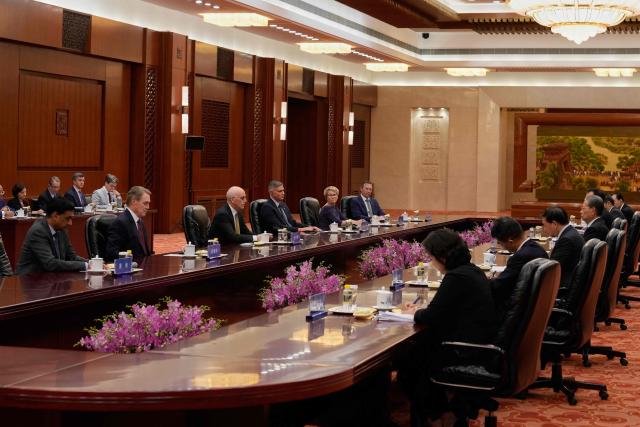 US Representative Adam Smith (3rd L) leads a bipartisan group of US lawmakers in a meeting with Zhao Leji, Chairman of China’s National People’s Congress Standing Committee, at the Great Hall of the People in Beijing on September 23, 2025. (Photo by Mahesh Kumar A. / POOL / AFP)