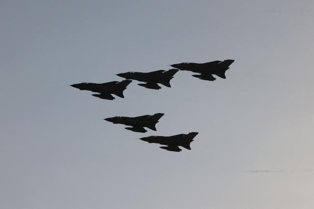 Royal Saudi Air Force fighter aircrafts fly over during an airshow marking Saudi Arabia's 95th National Day celebrations in Banban at the edges of Riyadh on September 23, 2025.  (Photo by Fayez Nureldine / AFP)