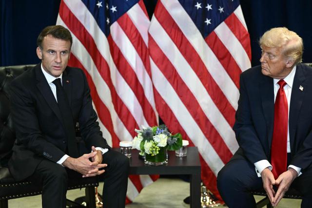 US President Donald Trump holds a bilateral meeting with France's President Emmanuel Macron (L) on the sidelines of the United Nations General Assembly in New York City on September 23, 2025. (Photo by Brendan SMIALOWSKI / AFP)