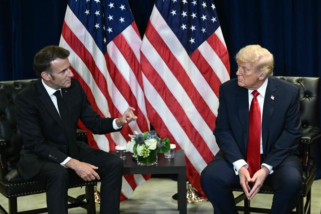 US President Donald Trump holds a bilateral meeting with France's President Emmanuel Macron (L) on the sidelines of the United Nations General Assembly in New York City on September 23, 2025. (Photo by Brendan SMIALOWSKI / AFP)
