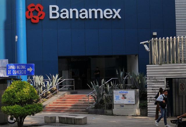 A branch of Banamex, Mexico's fourth largest financial group, is pictured in Mexico city on September 24, 2025. Mexican tycoon Fernando Chico Pardo has agreed to pay $2.3 billion to acquire a 25-percent stake in US banking giant Citi's Mexican subsidiary, the group said on September 24, 2025. (Photo by ROCIO VAZQUEZ / AFP)