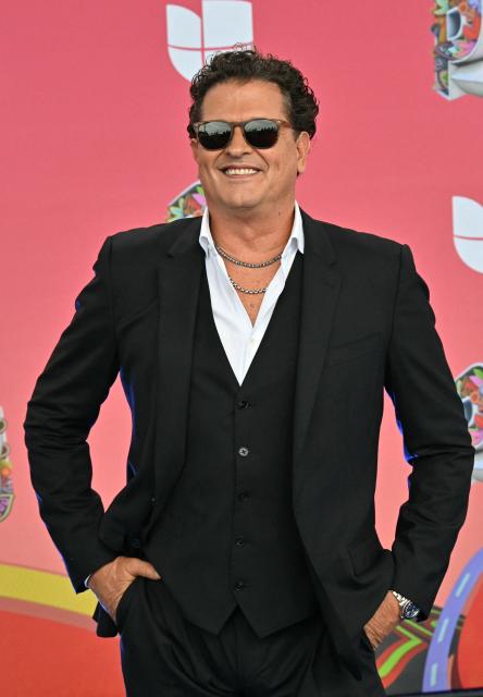 Colombian singer Carlos Vives attends the 22nd Premios Juventud music awards ceremony at the Figali Convention Centre in Panama City, on September 25, 2025. (Photo by MARTIN BERNETTI / AFP)
