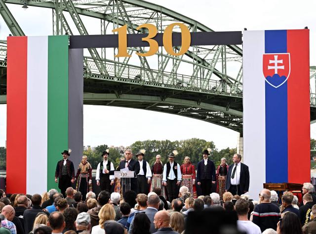 Hungarian Prime Minister Victor Orban addresses guests during a ceremony to celebrate the 130th anniversary of the Maria Valeria Bridge that connects the Slovak town of Sturovo with the Hungarian town of Esztergom, near the countries' common border in Esztergom, Hungary on September 28, 2025. The bridge links the two countries across the Danube river. It was opened on September 28, 1895. (Photo by Attila KISBENEDEK / AFP)