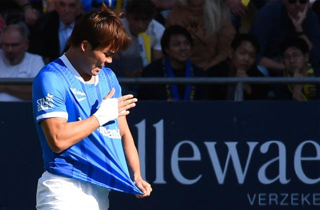 Genk's South Korean forward #09 Oh Hueon-Gyu celebrates after scoring a goal during the Belgian Jupiler Pro League football match between Sint-Truidense V.V. and KRC Genk in Sint-Truiden on September 28, 2025. (Photo by JILL DELSAUX / Belga / AFP) / Belgium OUT