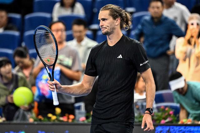 Germany’s Alexander Zverev reacts after winning a point against France’s Corentin Moutet during their men’s singles match at the China Open tennis tournament in Beijing on September 28, 2025. (Photo by Pedro Pardo / AFP)