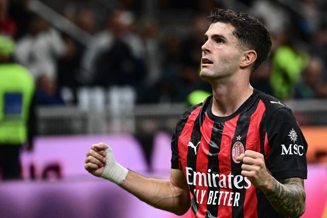 AC Milan's US forward #11 Christian Pulisic celebrates after scoring his team's second goal during the Italian Serie A football match between AC Milan and SSC Napoli at San Siro stadium in Milan, northern Italy, on September 28, 2025. (Photo by Piero CRUCIATTI / AFP)
