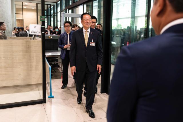 Thailand's Prime Minister Anutin Charnvirakul arrives at parliament in Bangkok on September 29, 2025. (Photo by Chanakarn Laosarakham / AFP)