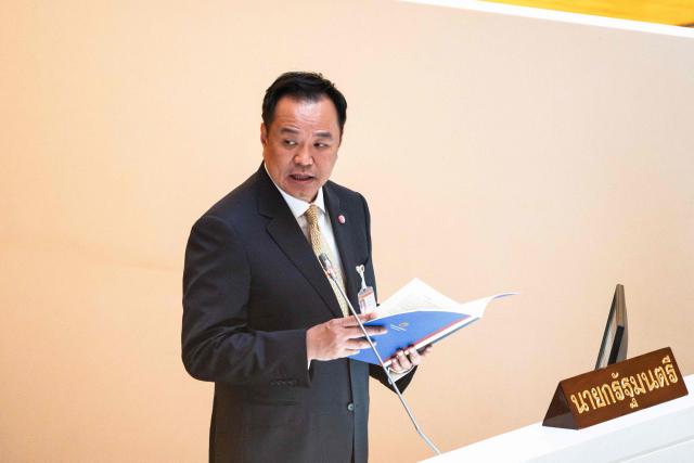Thailand's Prime Minister Anutin Charnvirakul arrives to deliver the cabinet policy speech at the parliament chamber in Bangkok on September 29, 2025. (Photo by Chanakarn Laosarakham / AFP)