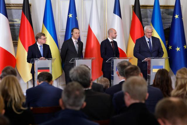 (LtoR) German Foreign Minister Johann Wadephul, Poland's Deputy Prime Minister and Foreign Affairs Minister Radoslaw Sikorski (L), and French Foreign Minister Jean-Noel Barrot  listen as Ukraine's Foreign Minister Andrii Sybiha addresses the joint press conference during a meeting of the so-called Weimar Triangle of France, Germany and Poland, in Warsaw, on September 29, 2025. (Photo by Wojtek RADWANSKI / AFP)