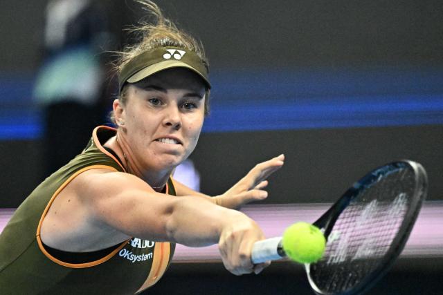 Czech Republic’s Linda Noskova hits a return to China’s Zheng Qinwen during their women’s singles match at the China Open tennis tournament in Beijing on September 29, 2025. (Photo by Pedro Pardo / AFP)