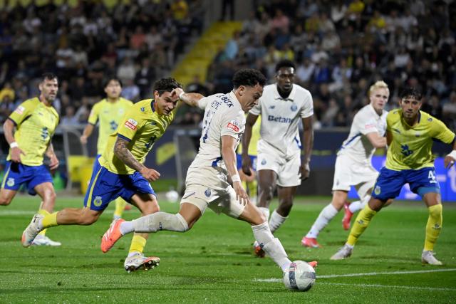FC Porto's Brazilian forward #11 Pepe kicks to score a goal that was later annulled during the Portuguese League football match between FC Arouca and FC Porto at the Municipal de Arouca stadium in Aveiro, on September 29, 2025. (Photo by Miguel RIOPA / AFP)