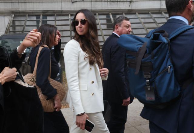 US businesswoman Charlie Javice, former fintech entrepreneur, leaves after her sentencing hearing at federal court in Manhattan on September 29, 2025, in New York City. Javice founded Frank, a college financial aid assistance startup, and was convicted on several charges relating to fraud after artificially inflating her customer numbers while selling her company to JP Morgan Chase for $175 million. She was sentenced today to 7 years in prison. (Photo by TIMOTHY A. CLARY / AFP)