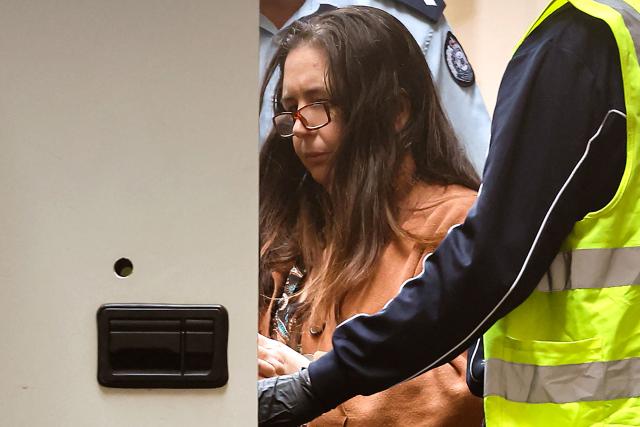 (FILES) Convicted murderer Erin Patterson leaves the Supreme Court of Victoria in Melbourne on September 8, 2025. Patterson will appeal her guilty verdict for killing three people with toxic mushrooms, her lawyer told a court on October 2, after a trial that sparked a global media frenzy. (Photo by MARTIN KEEP / AFP)
