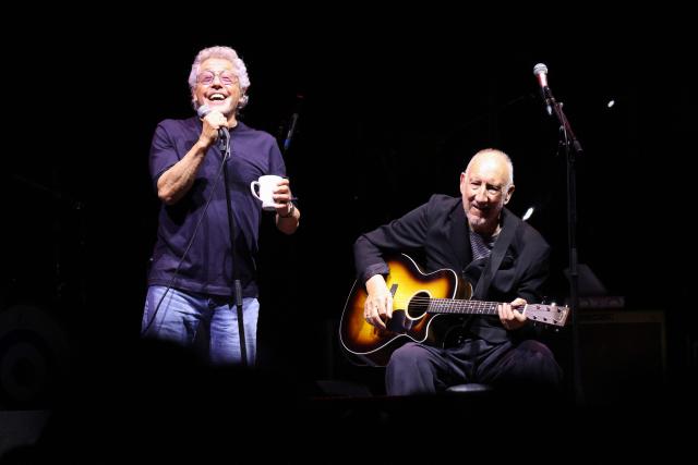 Roger Daltrey (L) and Pete Townshend of British rock band The Who perform on stage during their "The Song Is Over Farewell Tour" at Acrisure Arena in Palm Desert, California on October 1, 2025. (Photo by VALERIE MACON / AFP)