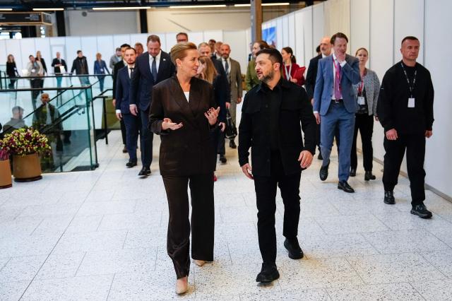 Denmark's Prime Minister Mette Frederiksen (L) meets with Ukraine's President Volodymyr Zelenskyy (R) prior to an meeting of the European Political Community (EPC) Summit at the Bella Center in Copenhagen on October 2, 2025. (Photo by Mads Claus Rasmussen / Ritzau Scanpix / AFP) / Denmark OUT