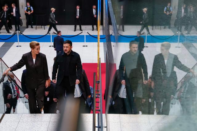 Denmark's Prime Minister Mette Frederiksen (L) meets with Ukraine's President Volodymyr Zelenskyy (R) arrives prior to an meeting of the European Political Community (EPC) Summit at the Bella Center in Copenhagen on October 2, 2025. (Photo by Mads Claus Rasmussen / Ritzau Scanpix / AFP) / Denmark OUT