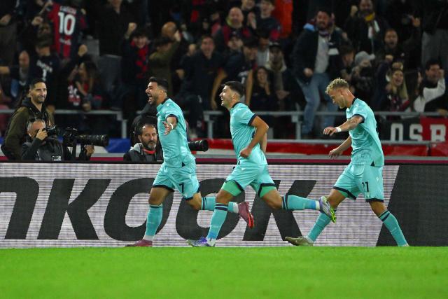 Bologna's Italian forward #07 Riccardo Orsolini (L) celebrates scoring his team's first goal during the UEFA Europa League 1st round day 2 football match between Bologna and Freiburg at the Renato Dall'Ara stadium in Bologna on October 2, 2025. (Photo by Andreas SOLARO / AFP)