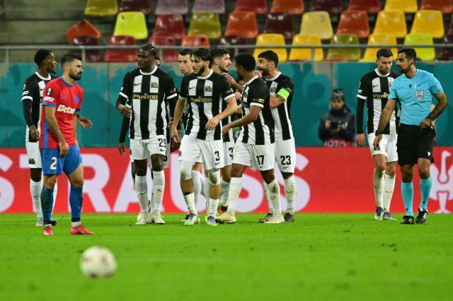 Young Boys' players celebrate after Young Boys' Swiss forward #77 Joel Monteiro scored their team's second goal during the UEFA Europa League first round day 2 football match FC Steaua Bucharest v Young Boys in Bucharest on October 2, 2025. (Photo by Daniel MIHAILESCU / AFP)