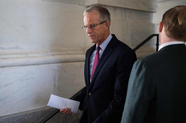US Senate Majority Leader John Thune, Republican from South Dakota,  leaves the US Capitol on the second day of the US government shutdown in Washington, DC on October 2, 2025. Efforts to swiftly end the US government shutdown collapsed October 1, 2025 as Democrats in Congress went home without resolving an acrimonious funding stand-off with President Donald Trump and the White House threatened public sector jobs. (Photo by ANDREW CABALLERO-REYNOLDS / AFP)