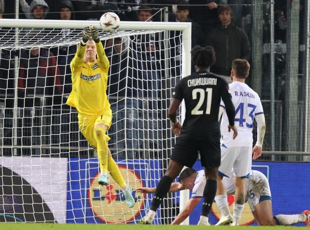 Sturm Graz's Danish goalkeeper #01 Oliver Christensen makes a save during the UEFA Europa League first round day 2 football match Sturm Graz v Glasgow Rangers in Graz, Austria, on October 2, 2025. (Photo by ERWIN SCHERIAU / APA / AFP) / Austria OUT