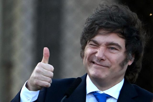 Argentina's President Javier Milei, gestures during the official presentation of a comprehensive reform bill for the Penal Code at Federal Penitentiary Complex No. 1 in Ezeiza, Buenos Aires province, on October 2, 2025. (Photo by Luis ROBAYO / AFP)