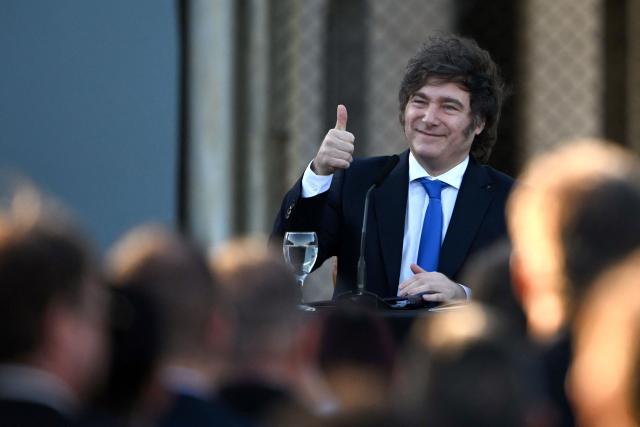 Argentina's President Javier Milei gives a thumb-ups during the official presentation of a comprehensive reform bill for the Penal Code at Federal Penitentiary Complex No. 1 in Ezeiza, Buenos Aires province, on October 2, 2025. (Photo by Luis ROBAYO / AFP)