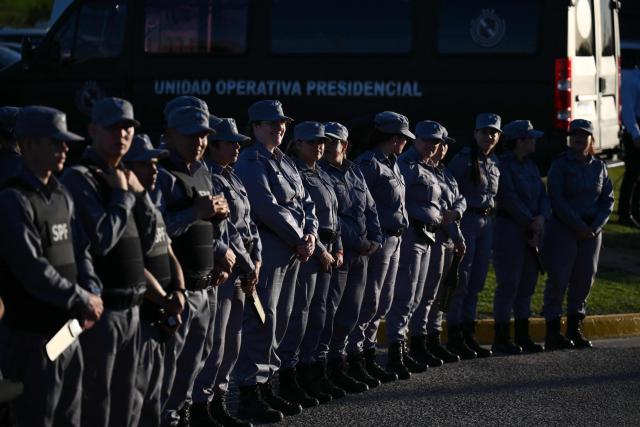 Members of the Federal Penitentiary Service attend the official presentation of a comprehensive reform bill for the Penal Code at Federal Penitentiary Complex No. 1 in Ezeiza, Buenos Aires province, on October 2, 2025. (Photo by Luis ROBAYO / AFP)