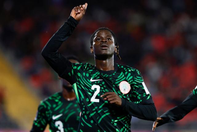 Nigeria's defender #2 Amos Ochoche celebrates scoring his team's second goal during the 2025 FIFA U-20 World Cup football match between Nigeria and Saudi Arabia at the Fiscal Stadium in Talca, Chile on October 2, 2025. (Photo by Raul BRAVO / AFP)