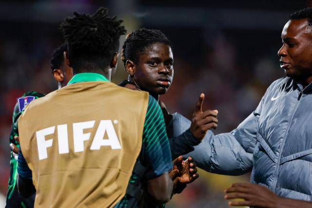 Nigeria's defender #2 Amos Ochoche celebrates scoring his team's second goal during the 2025 FIFA U-20 World Cup football match between Nigeria and Saudi Arabia at the Fiscal Stadium in Talca, Chile on October 2, 2025. (Photo by Raul BRAVO / AFP)