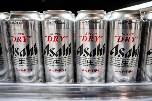 Asahi Super Dry beers are seen on display at a supermarket in Tokyo on October 3, 2025. Asahi Group Holdings, a major beer company, announced that it had experienced a system failure due to a cyber attack. (Photo by Yuichi YAMAZAKI / AFP)