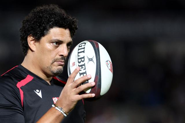 Lyon's French head coach Karim Ghezal looks on during the warm up ahead of the French Top14 rugby union match between Union Bordeaux-Begles (UBB) and Lyon Olympique Universitaire Rugby at the Chaban-Delmas Stadium in Bordeaux, south-western France, on October 4, 2025. (Photo by ROMAIN PERROCHEAU / AFP)