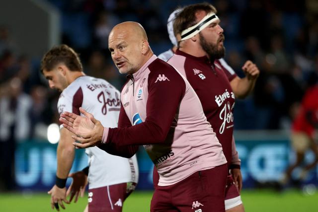 Bordeaux's French head coach Yannick Bru reacts during the warm up ahead of the French Top14 rugby union match between Union Bordeaux-Begles (UBB) and Lyon Olympique Universitaire Rugby at the Chaban-Delmas Stadium in Bordeaux, south-western France, on October 4, 2025. (Photo by ROMAIN PERROCHEAU / AFP)