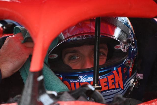 French YouTuber Lucas Hauchard, aka "Squeezie", waits helmeted in his car prior a sprint race, part of the F4 GP Explorer car race, at the Bugatti circuit in Le Mans, western France, on October 4, 2025. The three-day event brought together 200,000 spectators and some of the biggest names in French rap. (Photo by JEAN-FRANCOIS MONIER / AFP)