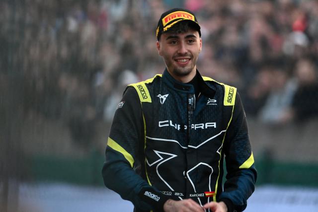 Spanish Youtuber "Karchez" smiles at the end of a sprint race, part of the F4 GP Explorer racing event at the Bugatti circuit in Le Mans, western France, on October 4, 2025. The three-day event brought together 200,000 spectators and some of the biggest names in French rap. (Photo by JEAN-FRANCOIS MONIER / AFP)
