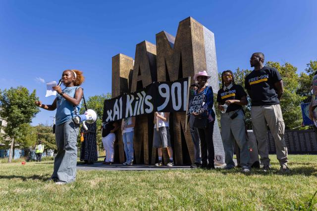 Jasmine Bernard, a high school organizer with Tigers Against Pollution, addresses the crowd at the I AM A MAN Plaza before a protest march through downtown Memphis, Tennessee, in opposition to the increase of federal law enforcement agents, the coming deployment of the National Guard and xAI, an AI company owned by Elon Musk that is locally based, during the "Get Out of Memphis" protest on October 4, 2025. Over the past week the city of Memphis has seen a dramatic increase in federal law enforcement as the Trump administration pledges to fight crime in the city. The protest was organized by Tigers Against Pollution, a student led activist group based in Memphis. (Photo by Austin Johnson / AFP)