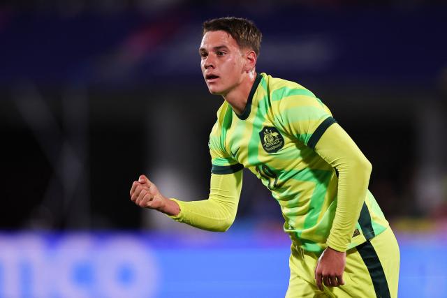 Australia's forward #19 Max Caputo celebrates scoring his team's first goal during the 2025 FIFA U-20 World Cup football match between Australia and Cuba at the National Stadium in Santiago on October 4, 2025. (Photo by Javier TORRES / AFP)