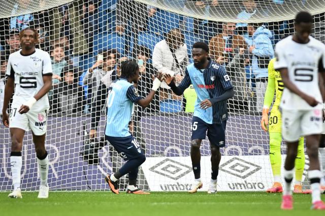 Le Havre’s Senegalese forward #45 Issa Soumare (3rdL) elebrates scoring his team's first goal during the French L1 football match between Le Havre AC and Stade Rennais FC at the Stade Oceane in Le Havre, north-western France, on October 5, 2025. (Photo by Lou BENOIST / AFP)