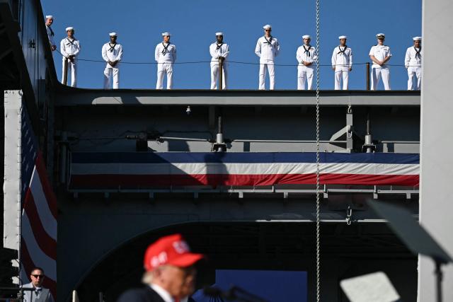US President Donald Trump delivers remarks during a visit to the USS Harry S. Truman during the US Navy's 250th anniversary celebration, "America's Navy 250: Titans of the Sea - A Salute to the Fleet", at Naval Station Norfolk Pier 14 in Norfolk, Virginia on October 5, 2025. (Photo by SAUL LOEB / AFP)