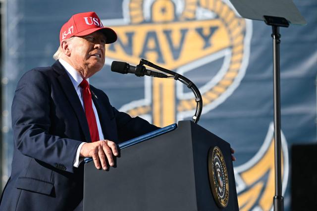 US President Donald Trump delivers remarks during a visit to the USS Harry S. Truman during the US Navy's 250th anniversary celebration, "America's Navy 250: Titans of the Sea - A Salute to the Fleet", at Naval Station Norfolk Pier 14 in Norfolk, Virginia on October 5, 2025. (Photo by SAUL LOEB / AFP)