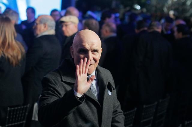 (FILES) Member of the Chamber of Deputies Jose Luis Espert waves to the media during a meeting with Argentina's President Javier Milei and other political leaders to sign the 'Pacto de Mayo' the eve of the independence day celebrations in Tucuman, Argentina on July 8, 2024. Jose Luis Espert, a deputy member of Argentine President Javier Milei's party, withdrew his candidacy for the end-of-month legislative elections on October 5, 2025, after acknowledging payments from a businessman who is under investigation for drug trafficking, a case that Milei attributed to a "sinister operation" by the opposition. (Photo by Walter Monteros / AFP)