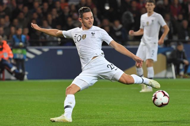 (FILES) France's forward Florian Thauvin kicks the ball during the friendly football match between France and Iceland at the Roudourou Stadium in Guingamp, western France on October 11, 2018. Lens' forward Florian Thauvin, world champion in 2018, has been called up to the French national team to replace Parisian Bradley Barcola, who is out due to injury, for the 2026 World Cup qualification matches against Azerbaijan and Iceland, the French Football Federation (FFF) announced on October 6, 2025. (Photo by LOIC VENANCE / AFP)