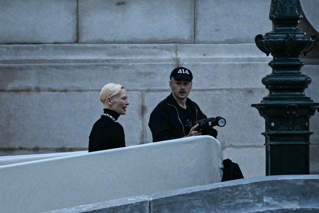 British actress Tilda Swinton arrives to attend the presentation of creations by Chanel for the Women Ready-to-wear Spring-Summer 2026 collection as part of the Paris Fashion Week, at the Grand Palais Ephemere in Paris on October 6, 2025. (Photo by Martin LELIEVRE / AFP)